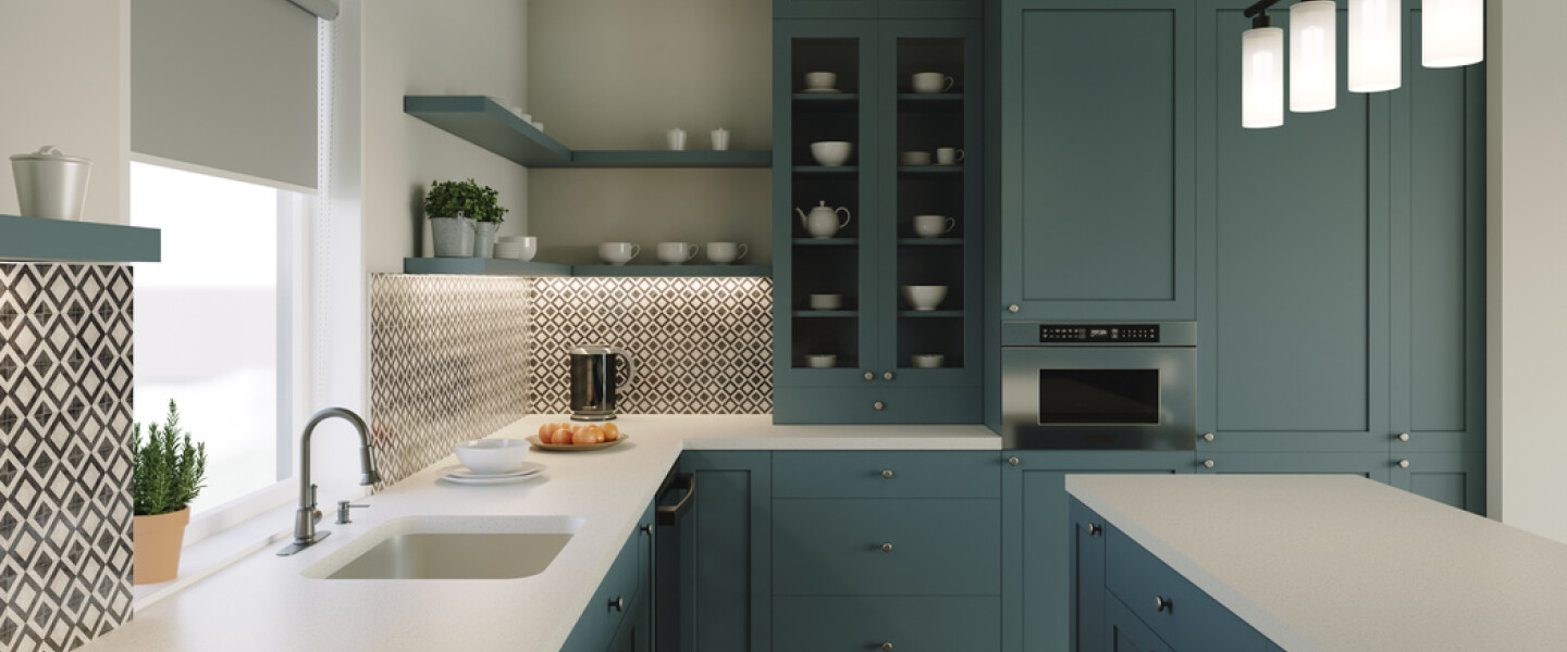 Modern kitchen with green cabinets